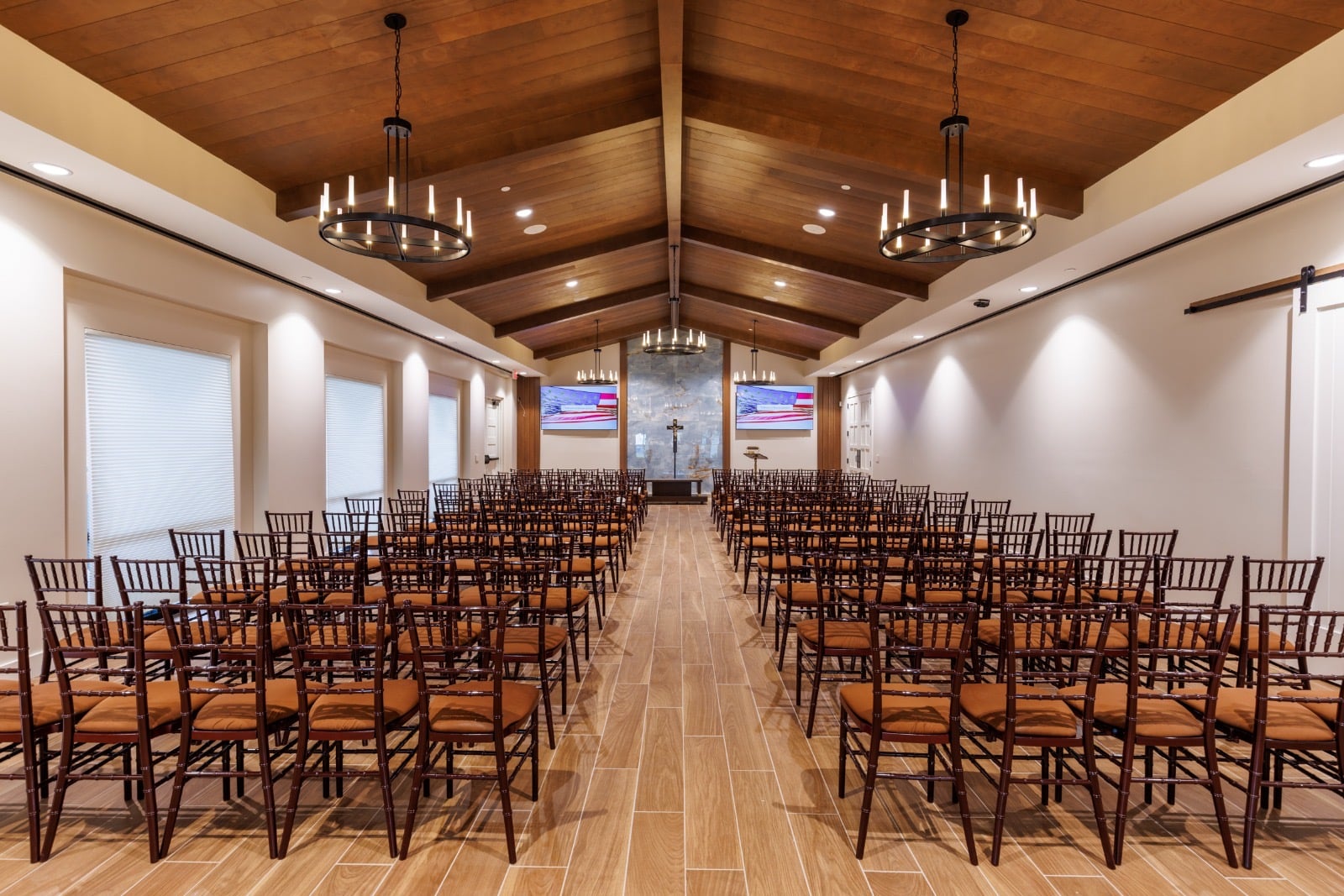 Assembly room with wood-look plank tile aisle