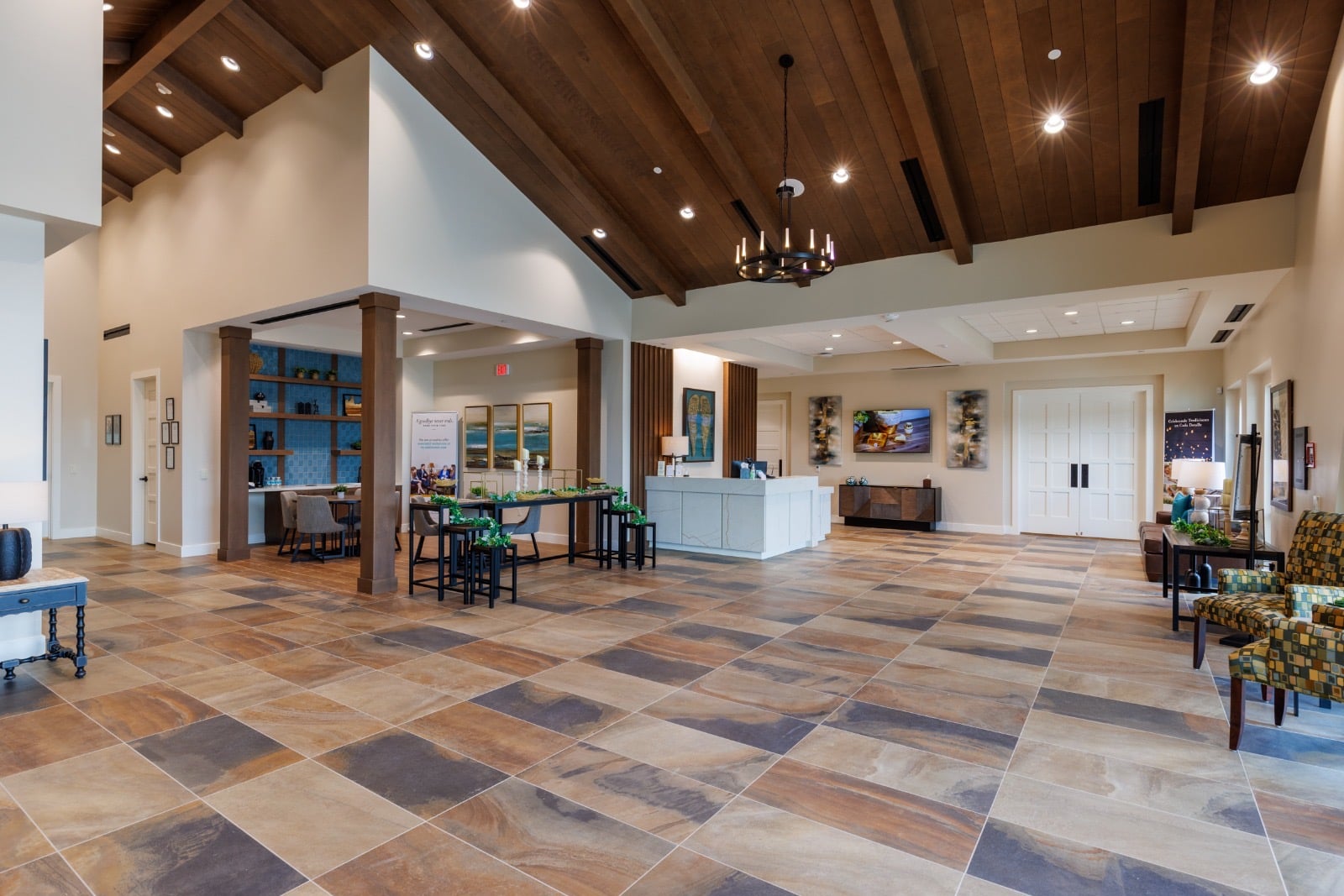 Reception hall with large-format tile flooring and a timber ceiling